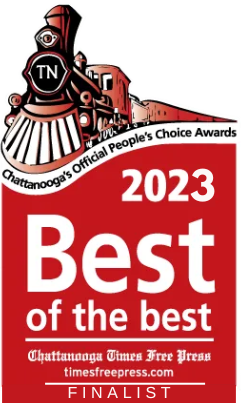 a red and white sign with a train on it