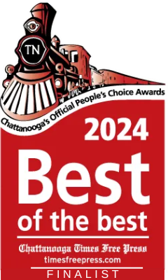 a red and white sign with a train on it