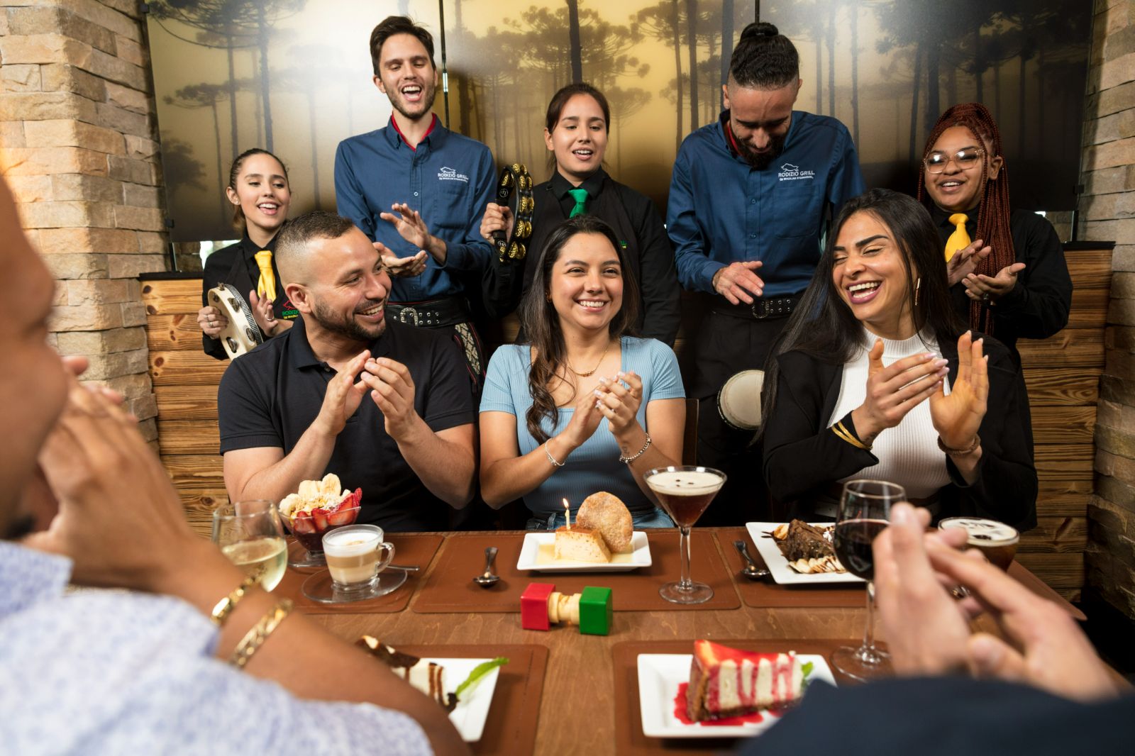 a group of people sitting around a table